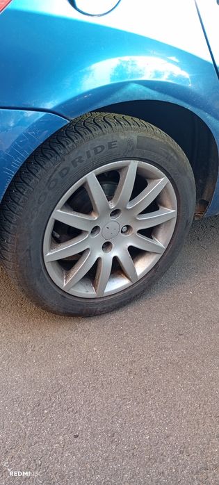 Jante Peugeot 16" + anvelope All Season – 4x108