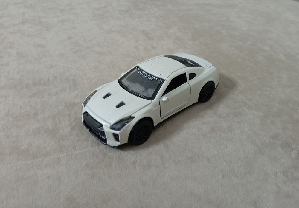 Железная машинка Nissan gtr am3 sport игрушка.
