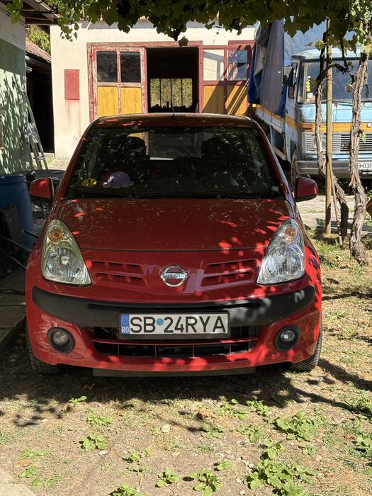 NISSAN Pixo 2010 — imagine 1