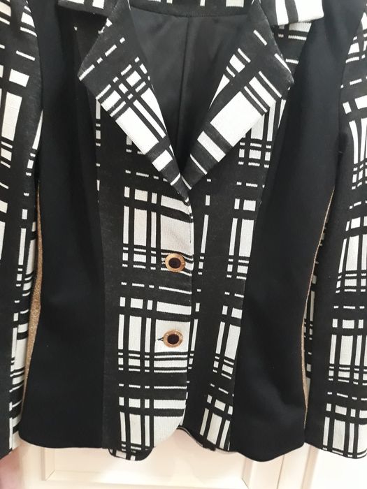 Елегантно сако на луци