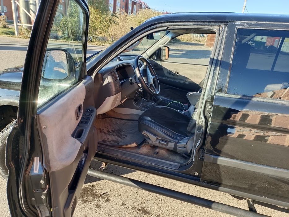 Мицубиси Монтеро спорт