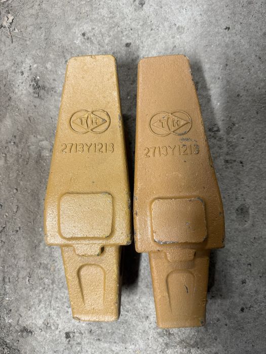 Продам коронки зубья адаптера на экскаваторы