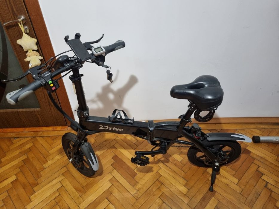 Bicicletă electrica pliabila