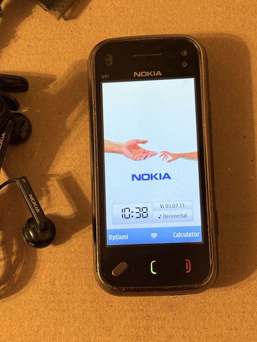 Vand Nokia N97 mini, În stare bună decodat cu baterie în stare nouă originală și căști incluse