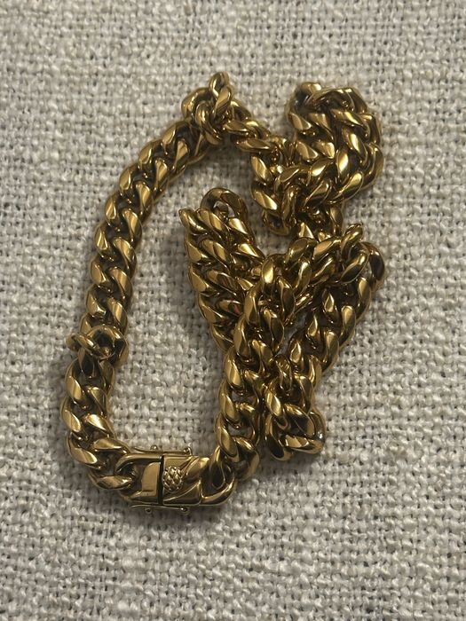 Lant Cuban grosime 10mm stainless steel placat cu aur de 18k.