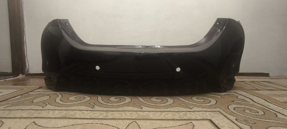 Задний бампер Toyota corolla 180
