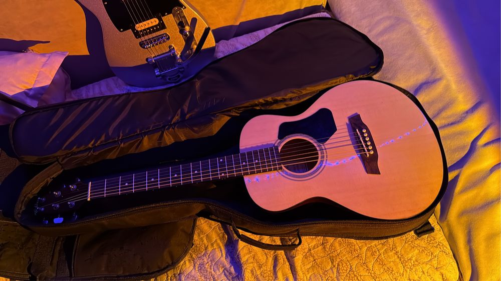 Учитель электрогитары