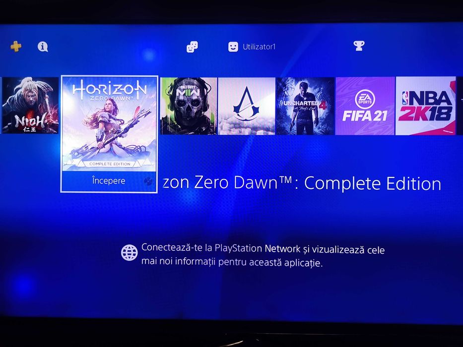 PS4 cu 2 manete + 8 jocuri bune