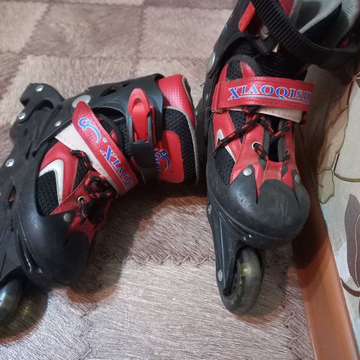 Роликовые коньки