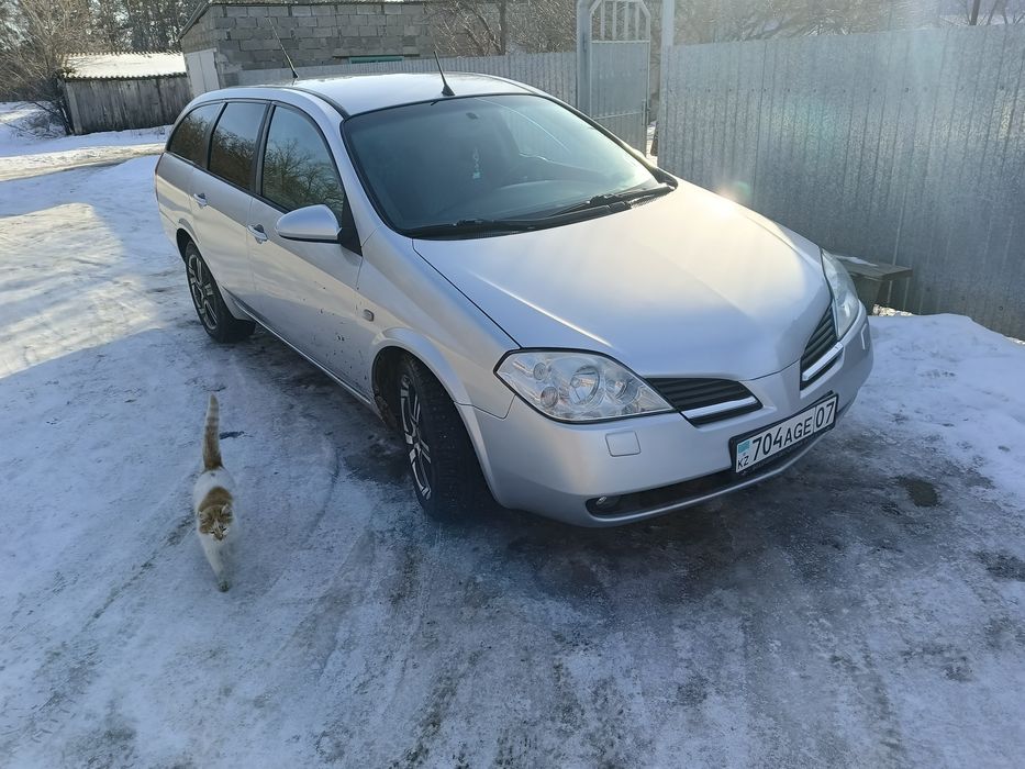 Продам нисан п12