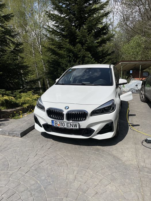 BMW 225xe active tourere, plug-in hibrid, an 2021, 83000km, tractiune integrala, M pachet, cumparata BMW Romania