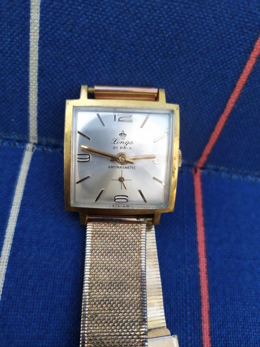 Позлатен швейцарски часовник