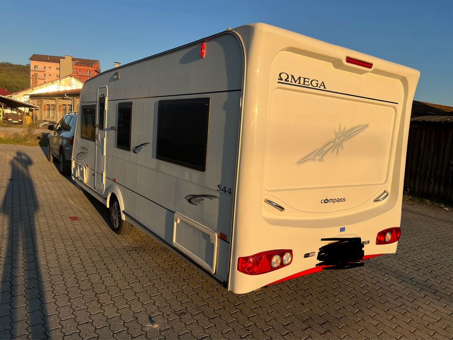 Compass omega pat matrimonial 2009 inm ro mover cort baie mare