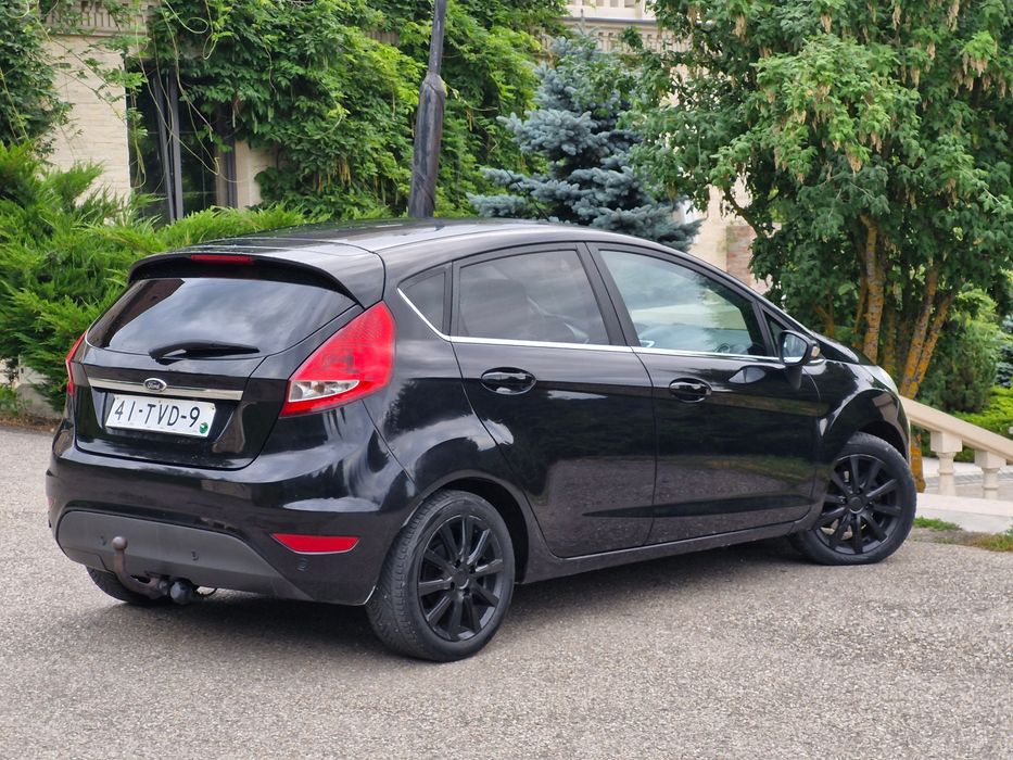 Ford Fiesta 2012 1.6 TDCi 95cp TITANIUM Încălzire in scaune Sony numere valabile xenon Pilot automat