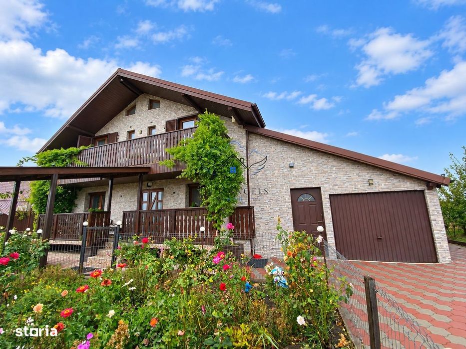 Casa individuala 4 dormitoare, 4 bai, garaj
