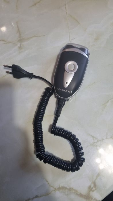 Vand aparat de ras electric Remington