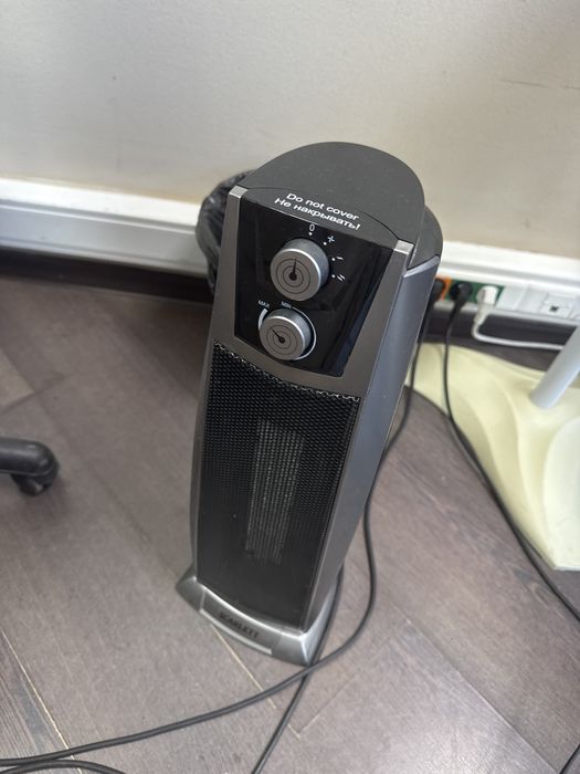 Обогреватель электрический вертится