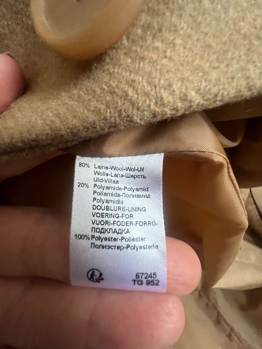 Вълнено дамско палто с пухкава яка