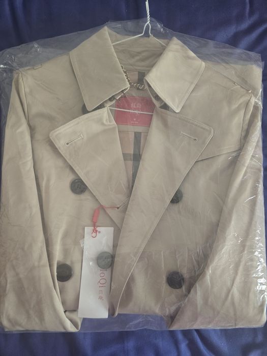 Продам тренч новый..