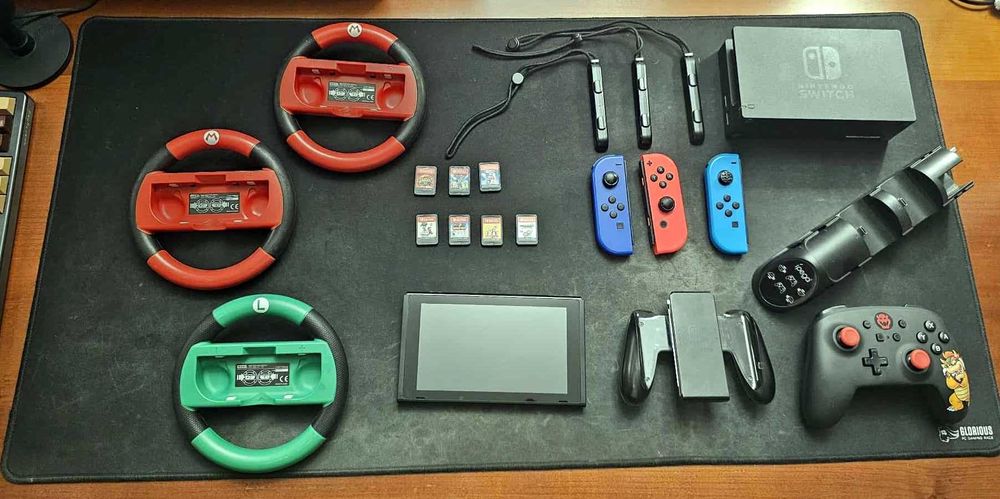 Nintendo Switch + 7 jocuri originale + multe accesorii