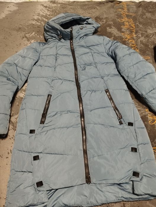 Куртка женские сотилади. Холати янги. 42-размер.