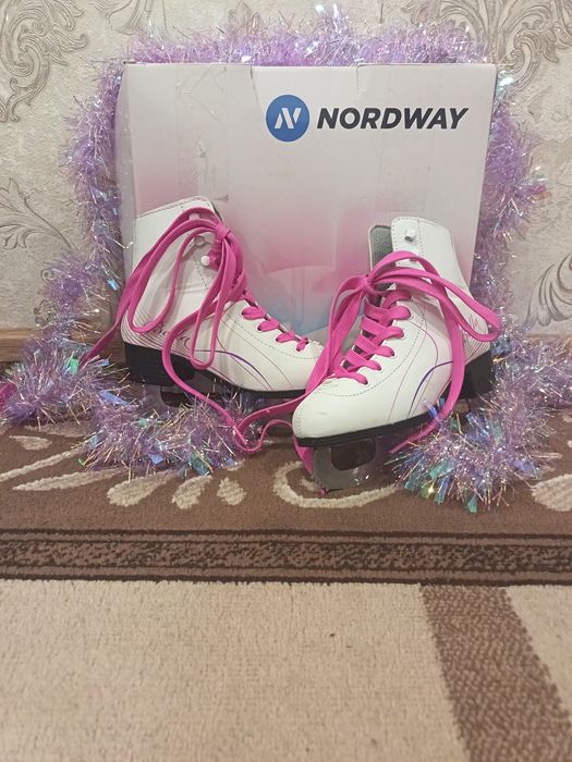 Продам фигурные коньки