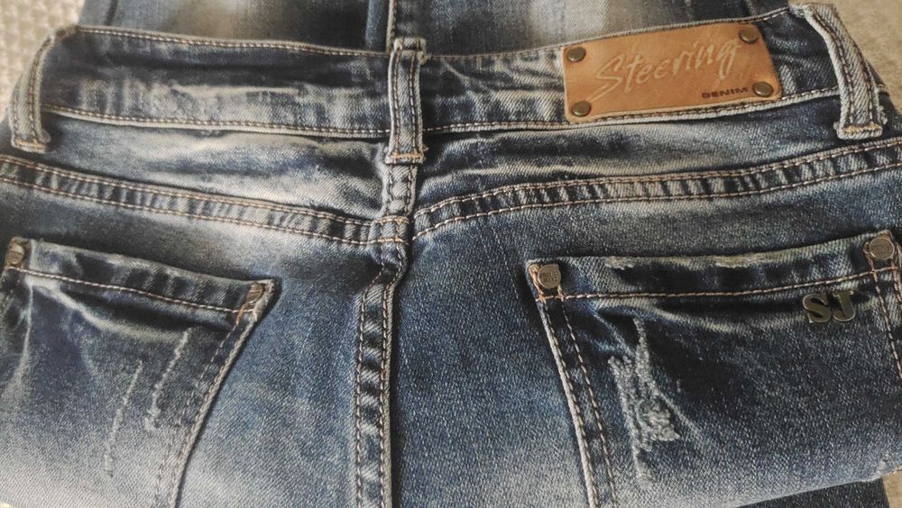 Джинсы STEERING рваные