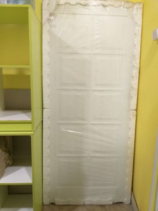 Новая дверь в упаковка