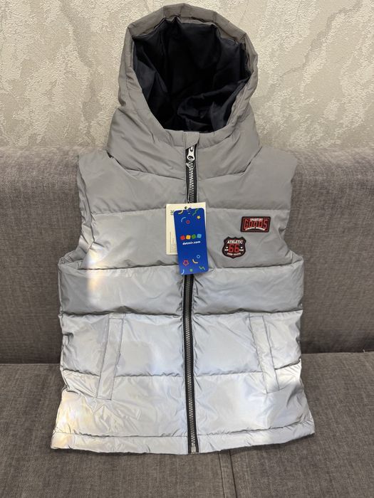 Новый детский жилет 128 р