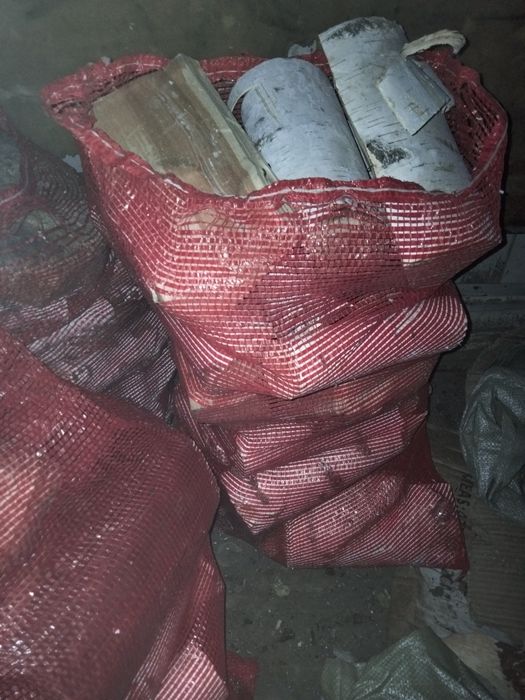 Дрова, в мешках.