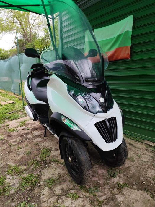 Пиаджо МП3 Piaggio MP3 300 кубика