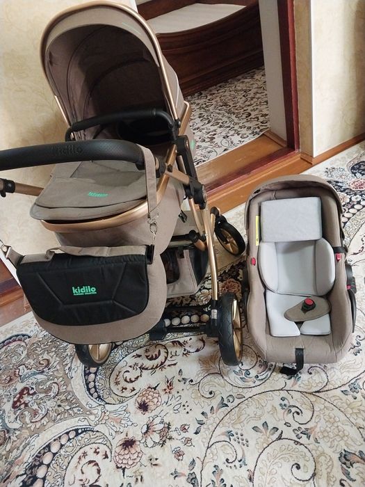 Детская коляска с автокреслом