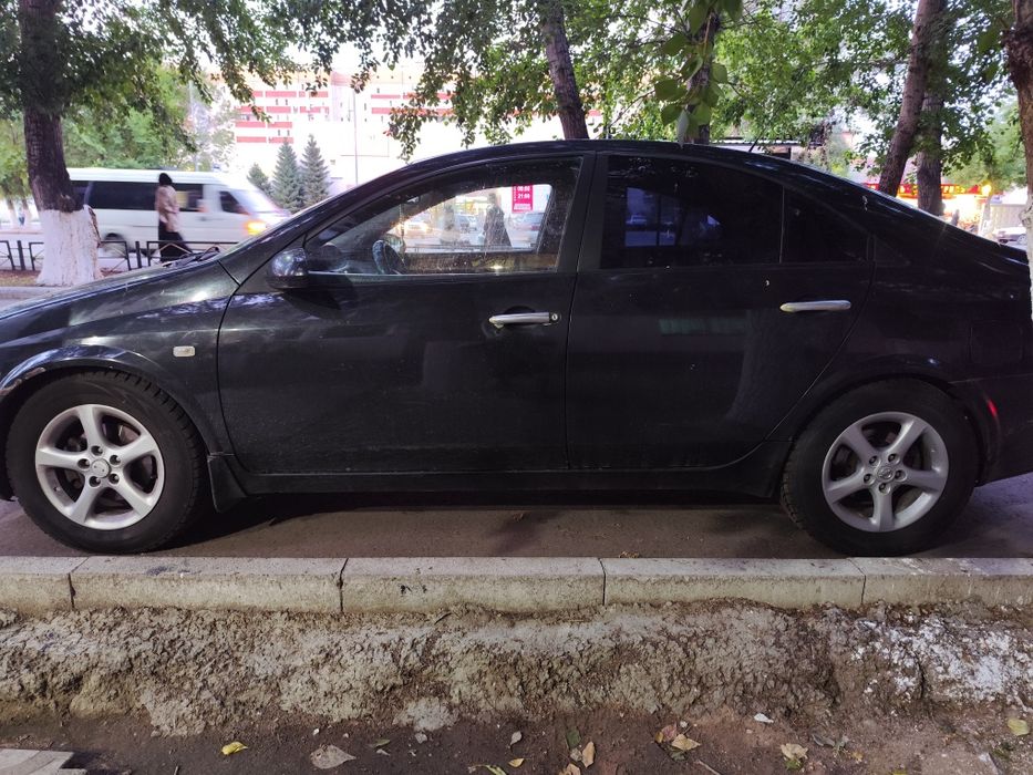 Машина Nissan Primera