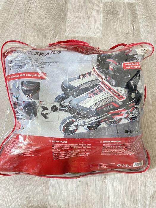 Роликовые коньки