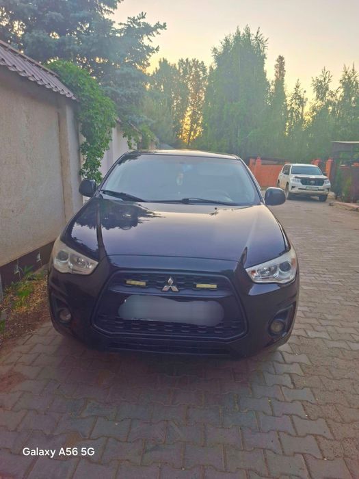 Продам автомашину черного цвета марка Mitsubishi