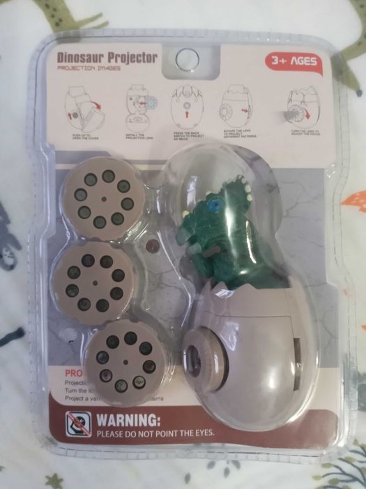 Новая игрушка мини проектор Dino