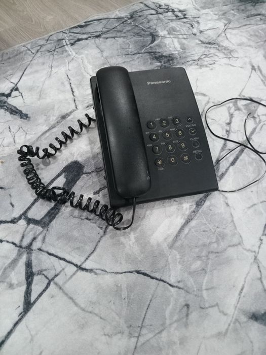 Продаю домашний телефон