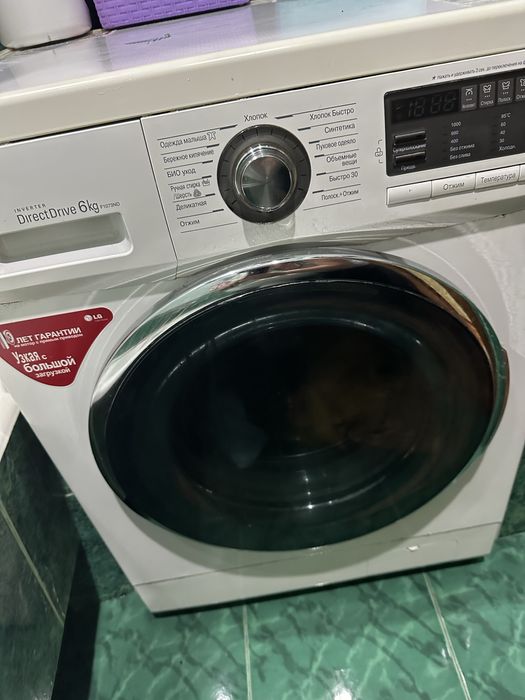 Машинка стиральная в среднем состоянии