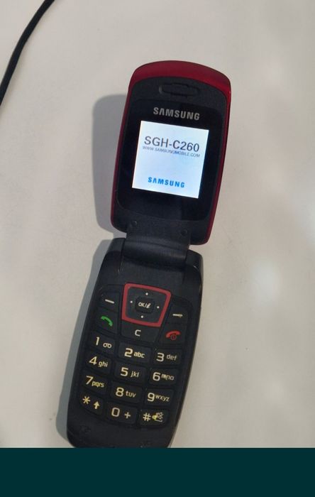 Telefon cu clapeta Samsung cu încărcător original