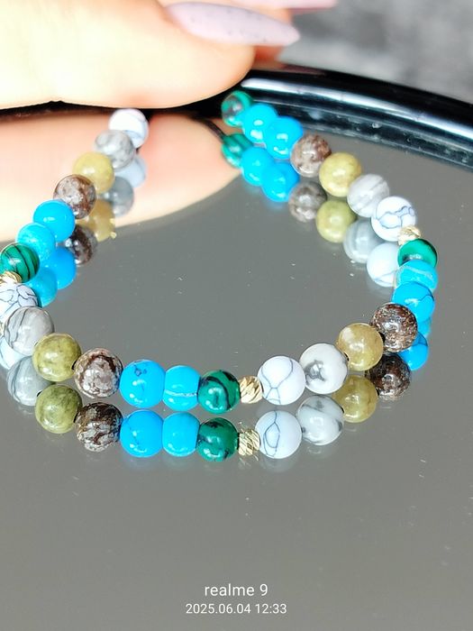 Brățări cu biluțe din aur