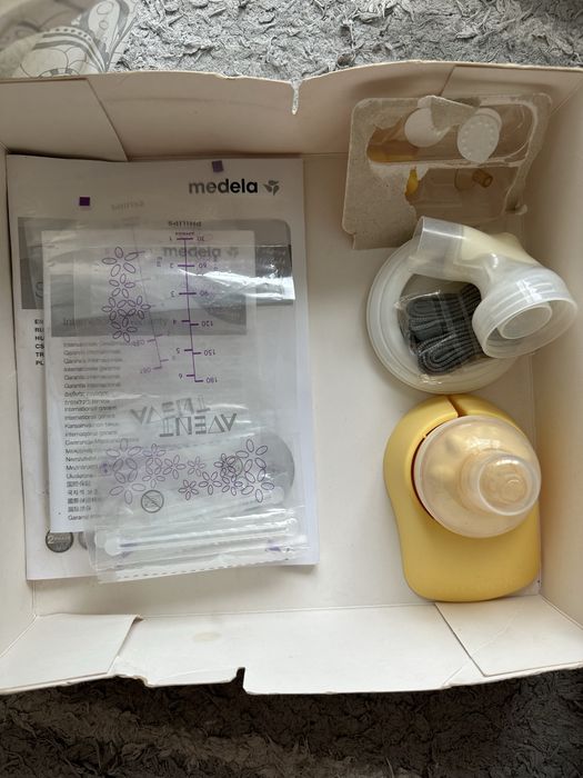Электронный молокоотсос Medela