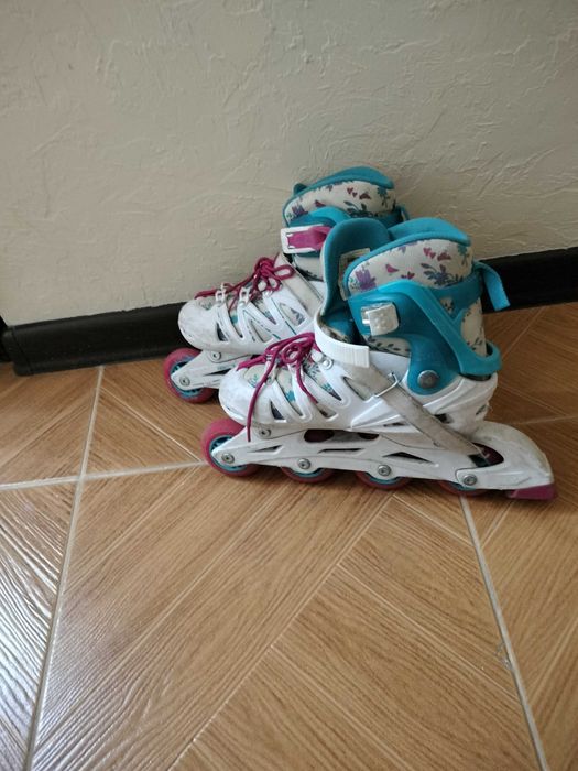 Коньки роликовые