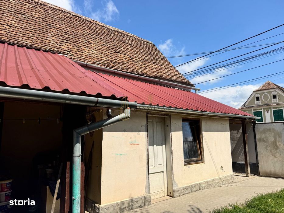 Casă la țară cu teren generos în satul Ruși