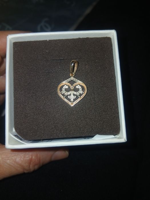 Продам кулон  бриллиант