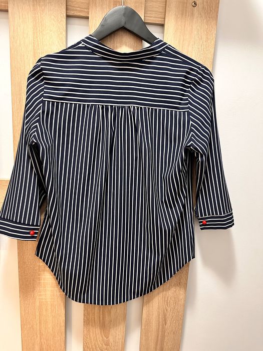 Cămașa cu mânecă 3 sferturi