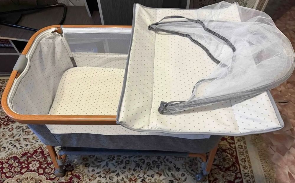 Продам кроватку приставную