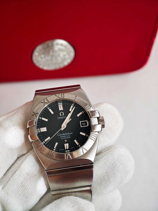 БАРТЕР Omega Constellation Double Eagle Perpetual Calendar