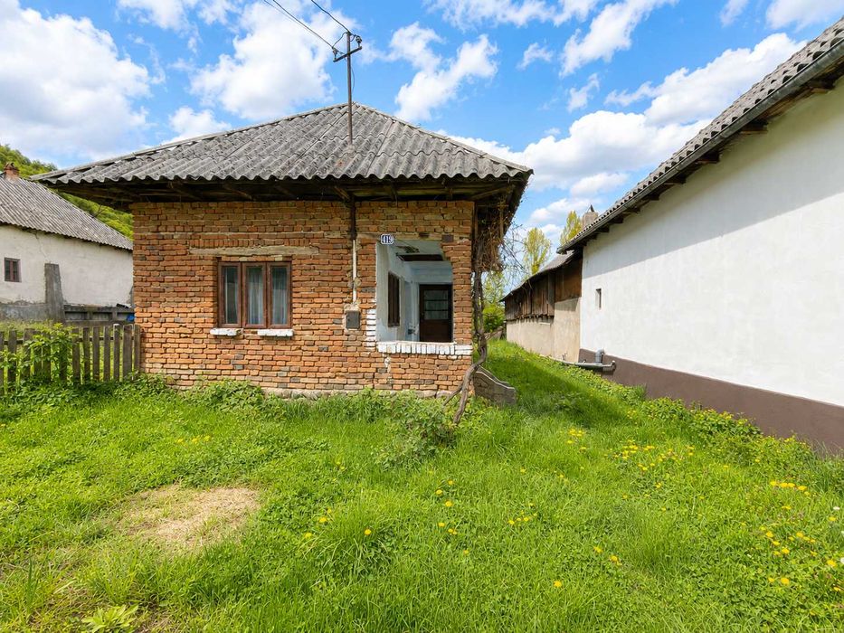 Casă cu teren 1200 mp + loturi suplimentare 800+200 mp | total 2200 mp | Bădești, Argeș – 24.650 €