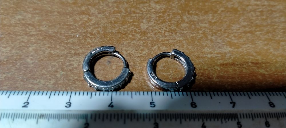 Кулоны, серёжки серебряные.