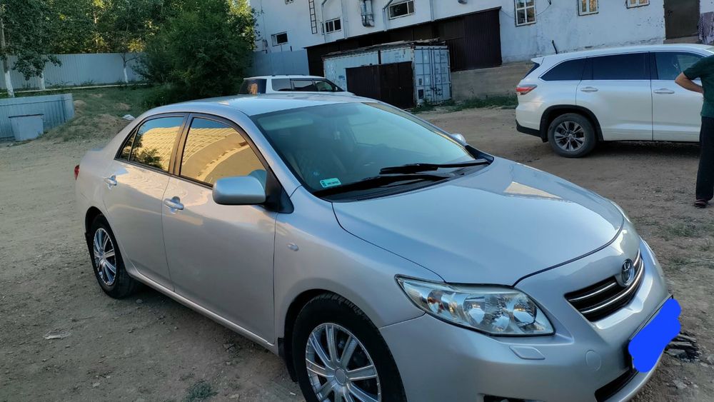 Toyota Corolla 2009 г.